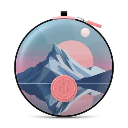 Round pouch with mountain design and pink logo on a white background