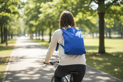 Blue Backpack on a woman on a bike