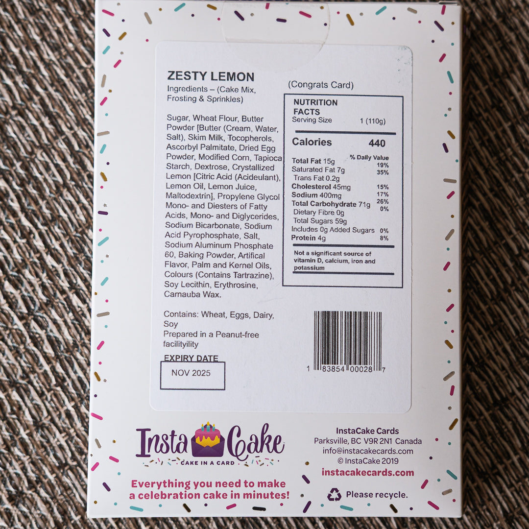 Back of an InstaCake Zesty Lemon cake card packaging with ingredients, nutrition facts, and branding.